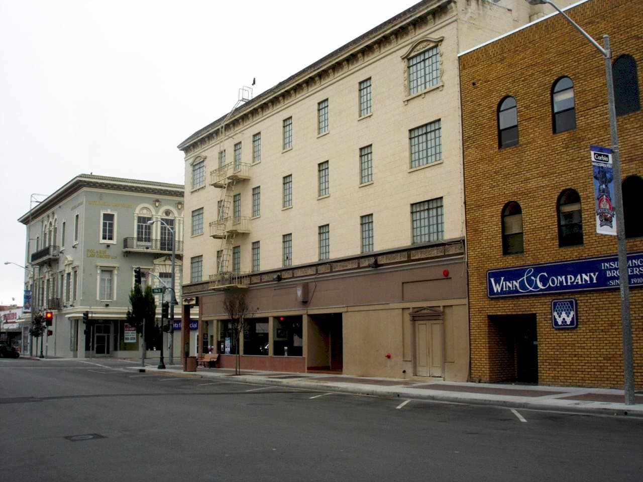 Historic commercial buildings on Fifth Street at San Benito Street in downtown Hollister.