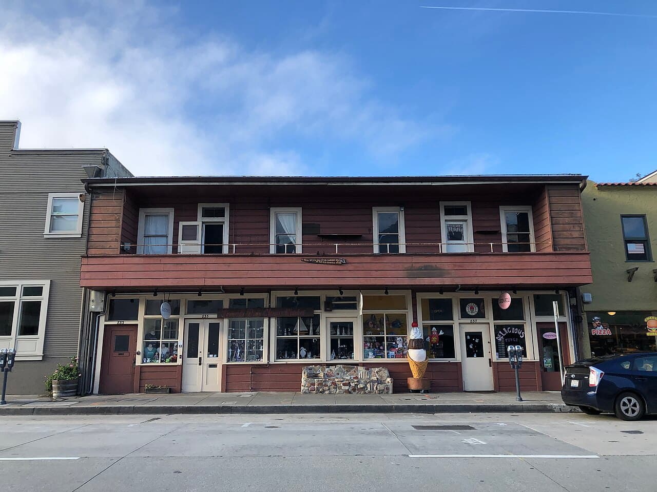 Historic two-story storefronts along Cannery Row in Monterey.