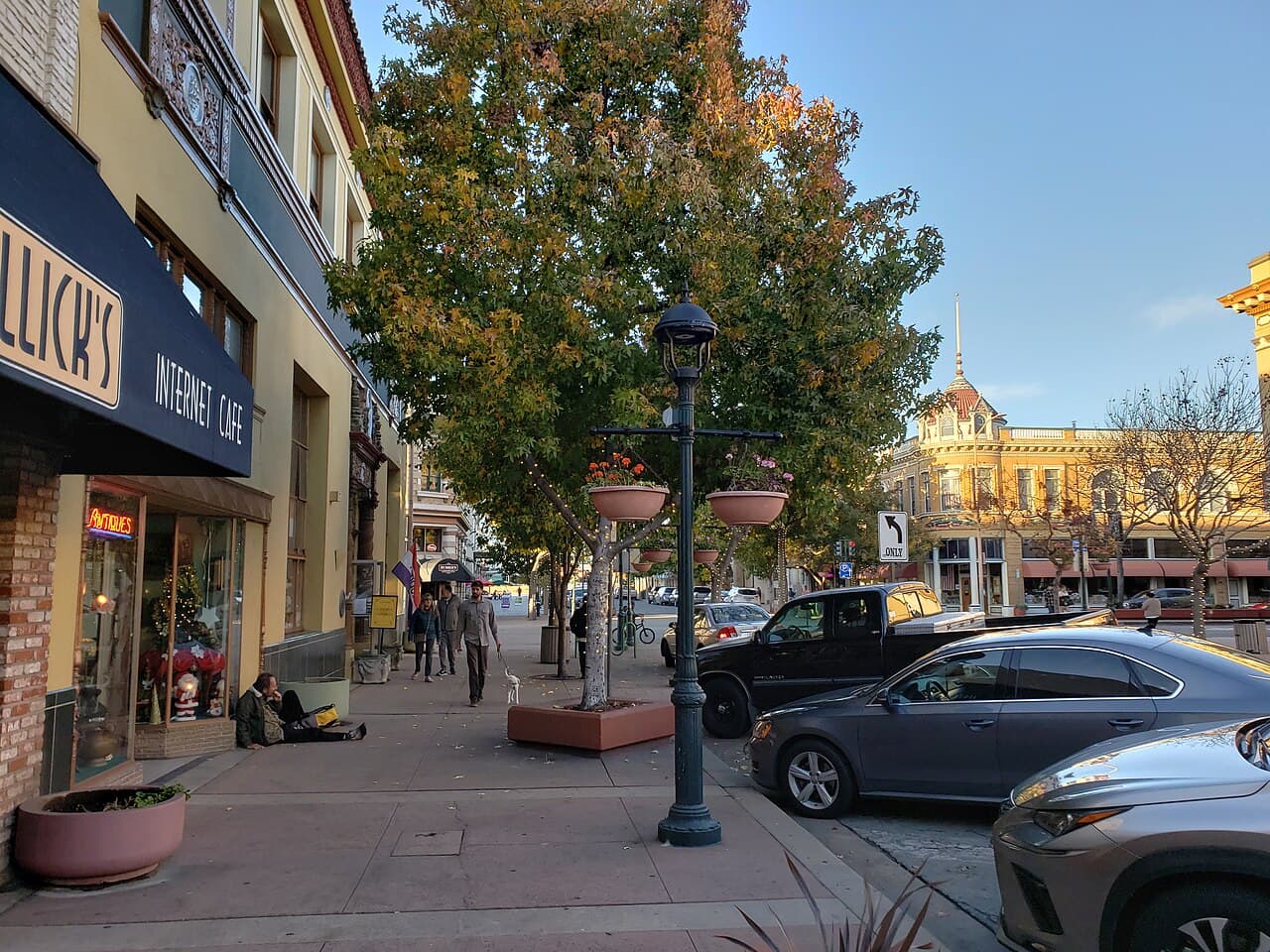 Shopfronts, historic buildings and tree-lined sidewalks along Main Street in downtown Salinas.