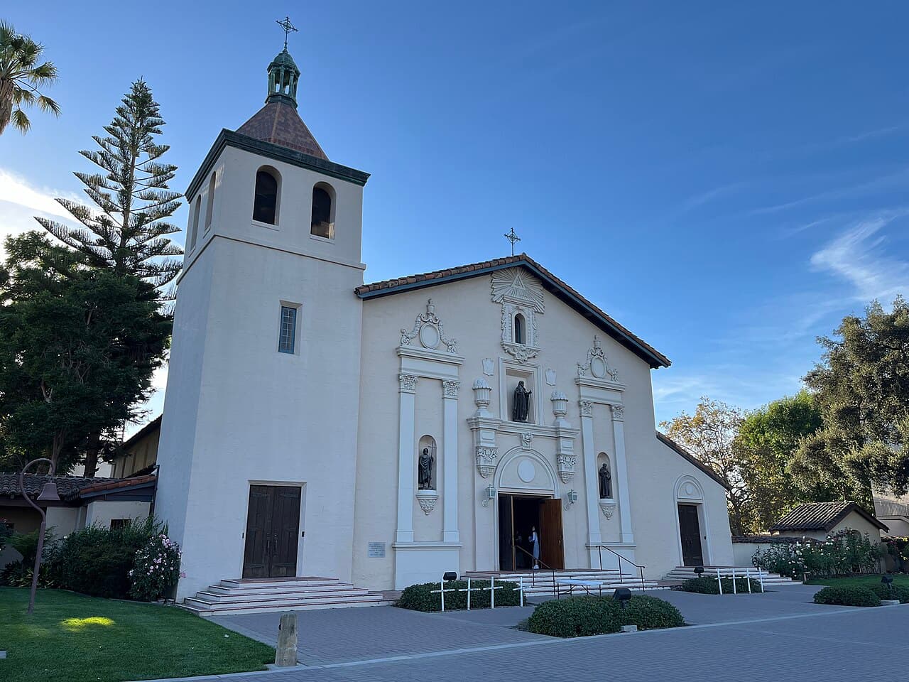 Mission Santa Clara de Asís and its landscaped grounds.