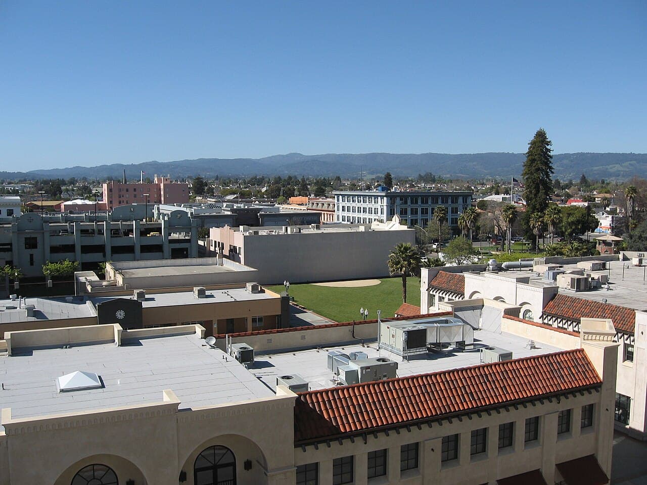 Downtown Watsonville rooftops and its central plaza, viewed from the Civic Plaza building.
